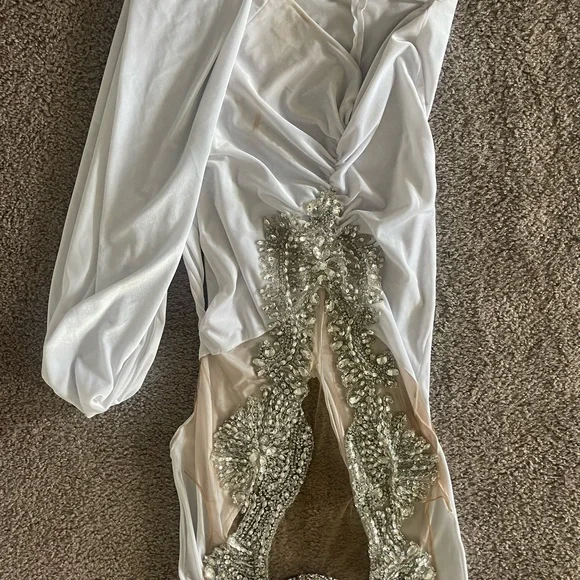 Custom birthday dress , minor flaws , only worn once .. paid 450 .